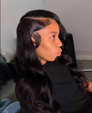 Sew-in hairstyle with styled edges